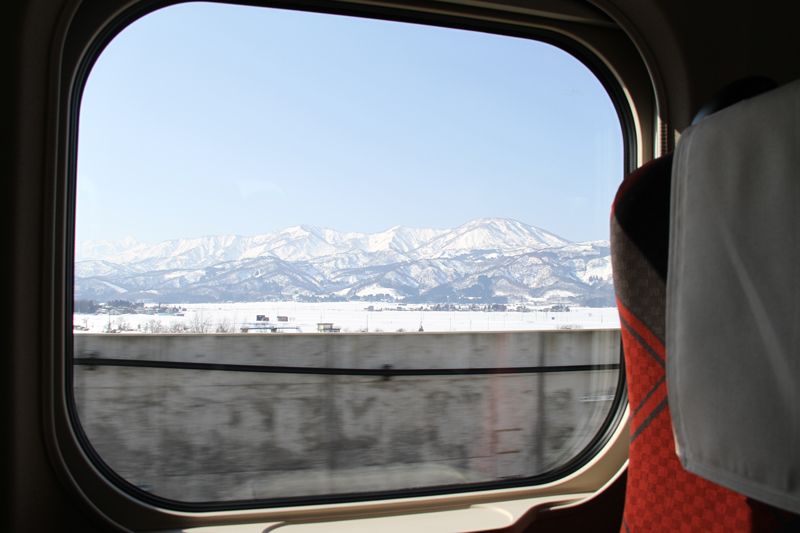 Snow-covered mountains near Jyōetsu-Myōkō Station.