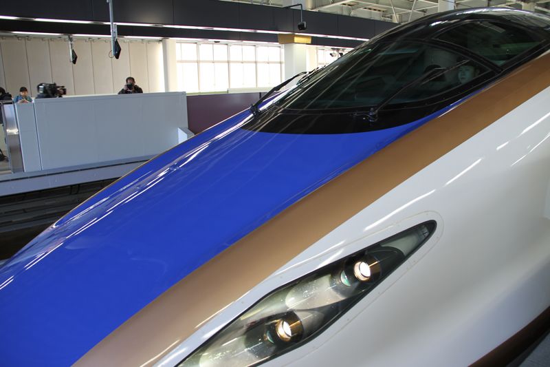 The W7 series Shinkansen waits at Kanazawa Station.