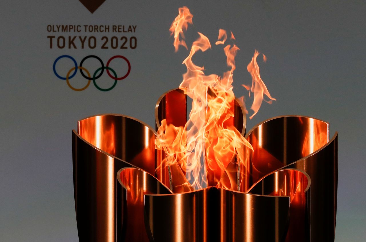 إشعال الشعلة الأولمبية في اليوم الأول من تتابع شعلة أولمبياد طوكيو 2020 في ناراها، محافظة فوكوشيما، اليابان، 25 مارس/ آذار، 2021. رويترز / كيم كيونغ هون.