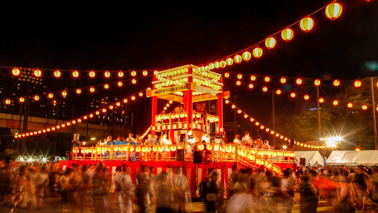 A cucumber horse and eggplant cow decoration displayed during Obon.
