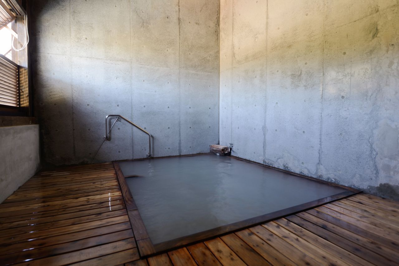 The renovated indoor bath is kept filled with water gushing forth constantly from the spring.
