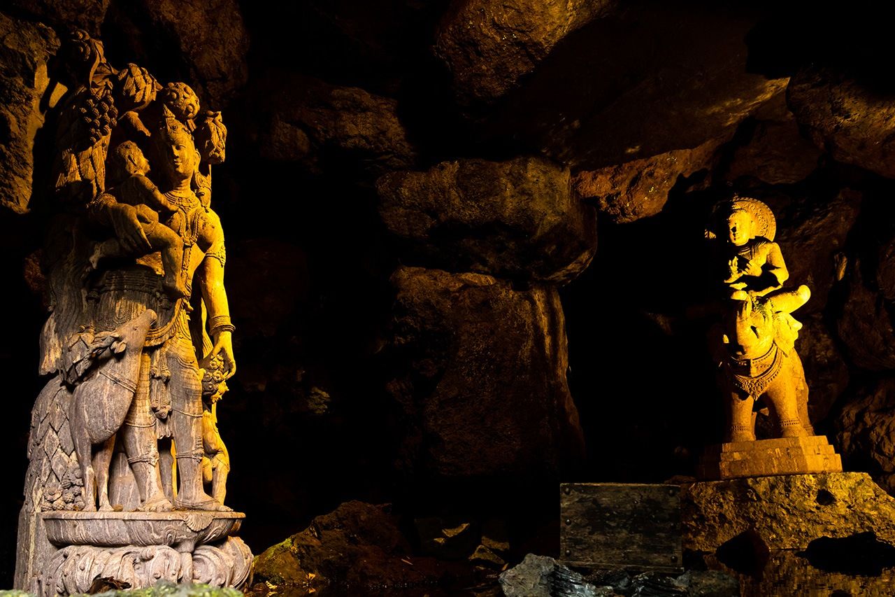 A cave at the top of the hillside garden houses two sculptures Itchiku dedicated to his mother: the Bodhisattva Samantabhadra (Fugen Bosatsu), seated on an elephant, at right and a figure of a woman and child on the left.