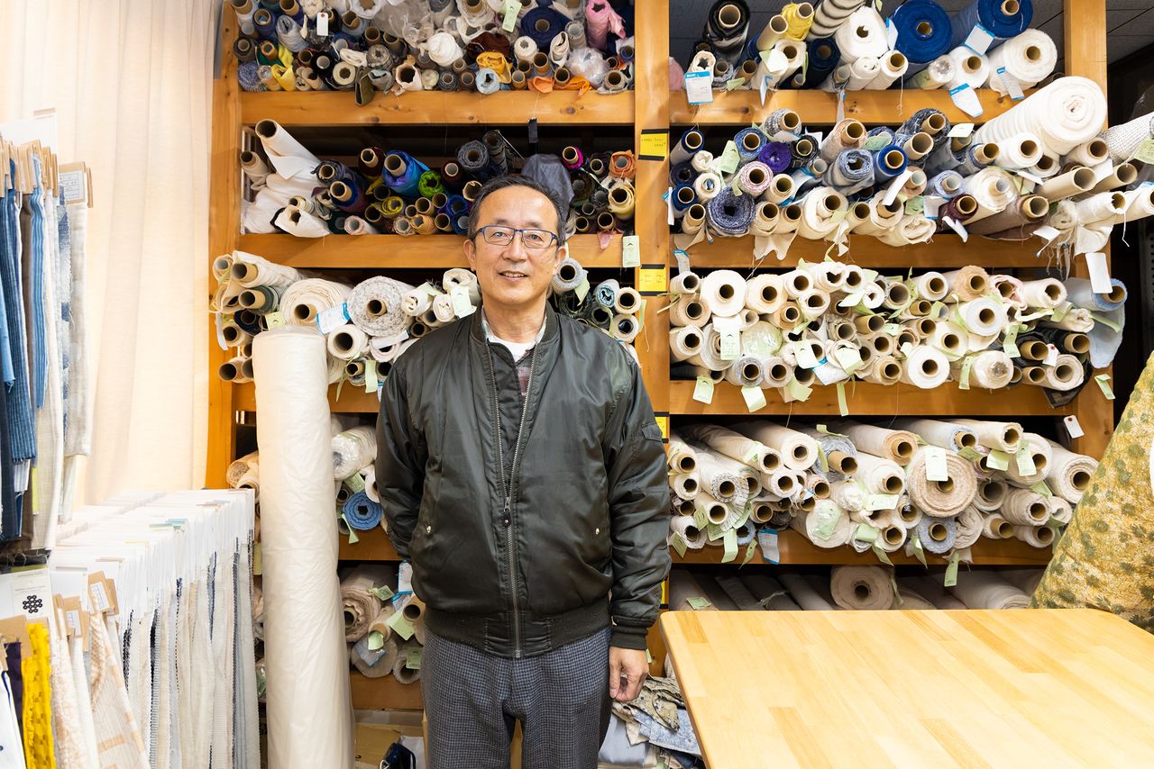 Maeda Tomio, of Maedagen. The shop originally was in the business of weaving silk for umbrellas and other items, but has recently branched out into organic cotton.