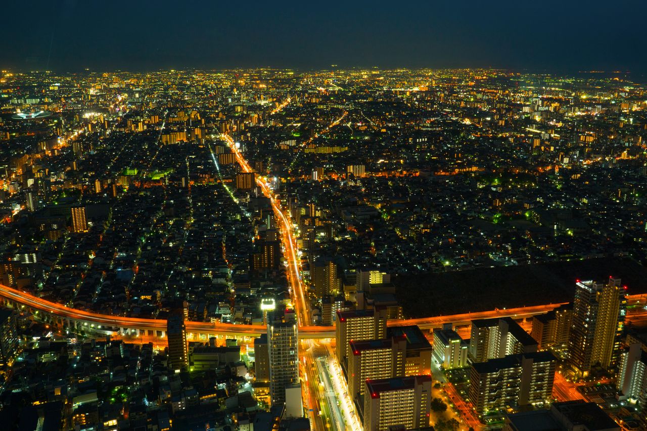 Gazing south from Abeno Harukas, the city lights stretch to the horizon.