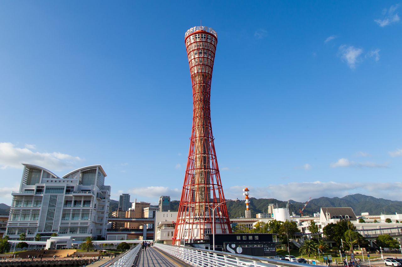 Kobe Port Tower, a local landmark. The structure, shaped like a traditional hand drum, has a five-story observation deck at the top.