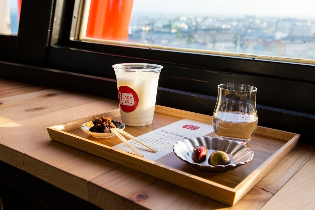 Amazake from the breweries of Nada is \500, and sake starts from \700. Hyakumoku (right) is the first new sake brand launched by Kiku Masamune in 130 years.