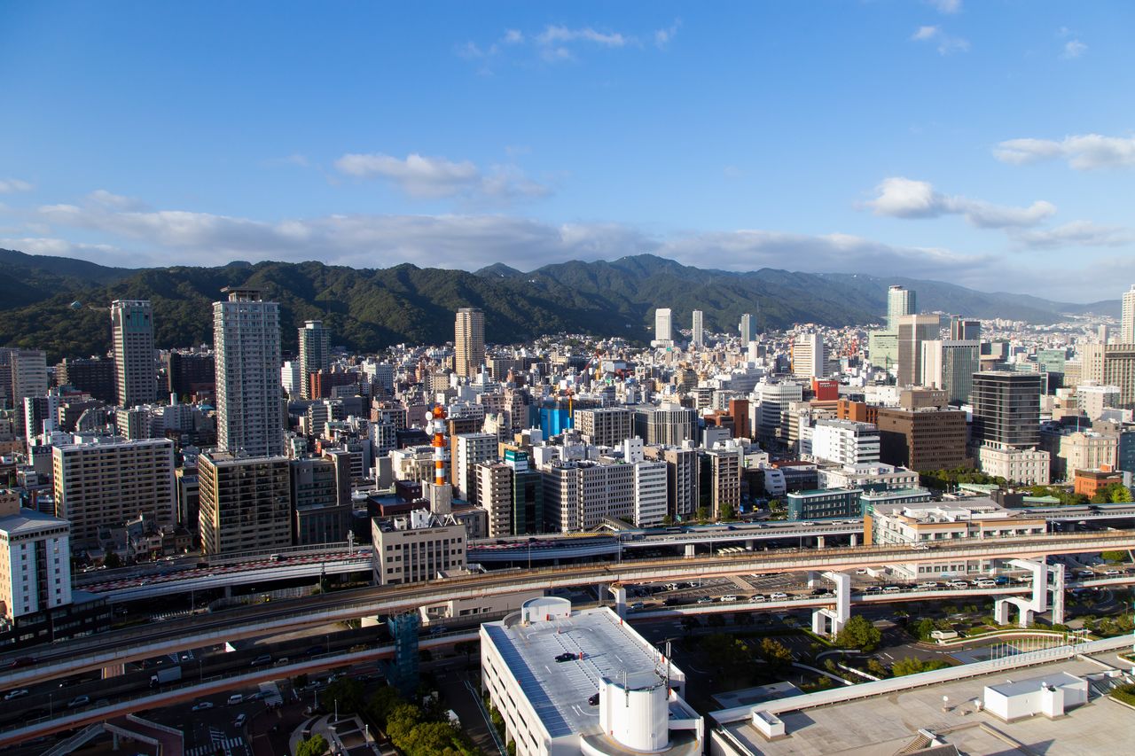 On the north side, a view of Kobe and the Rokkō mountains in the distance.