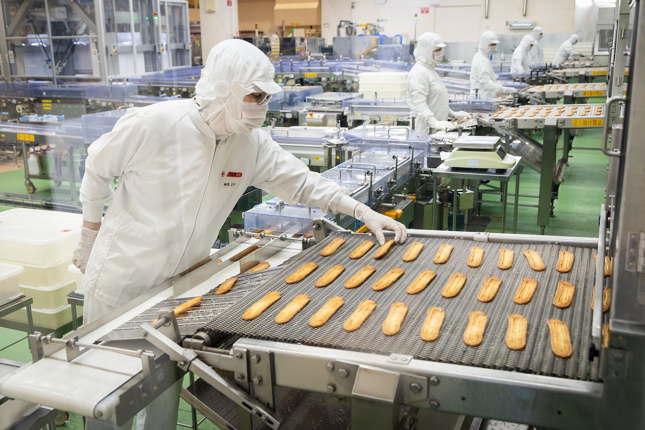 At the final stage, products are visually inspected. Broken or misshapen pastries are bagged and sold at discount prices.