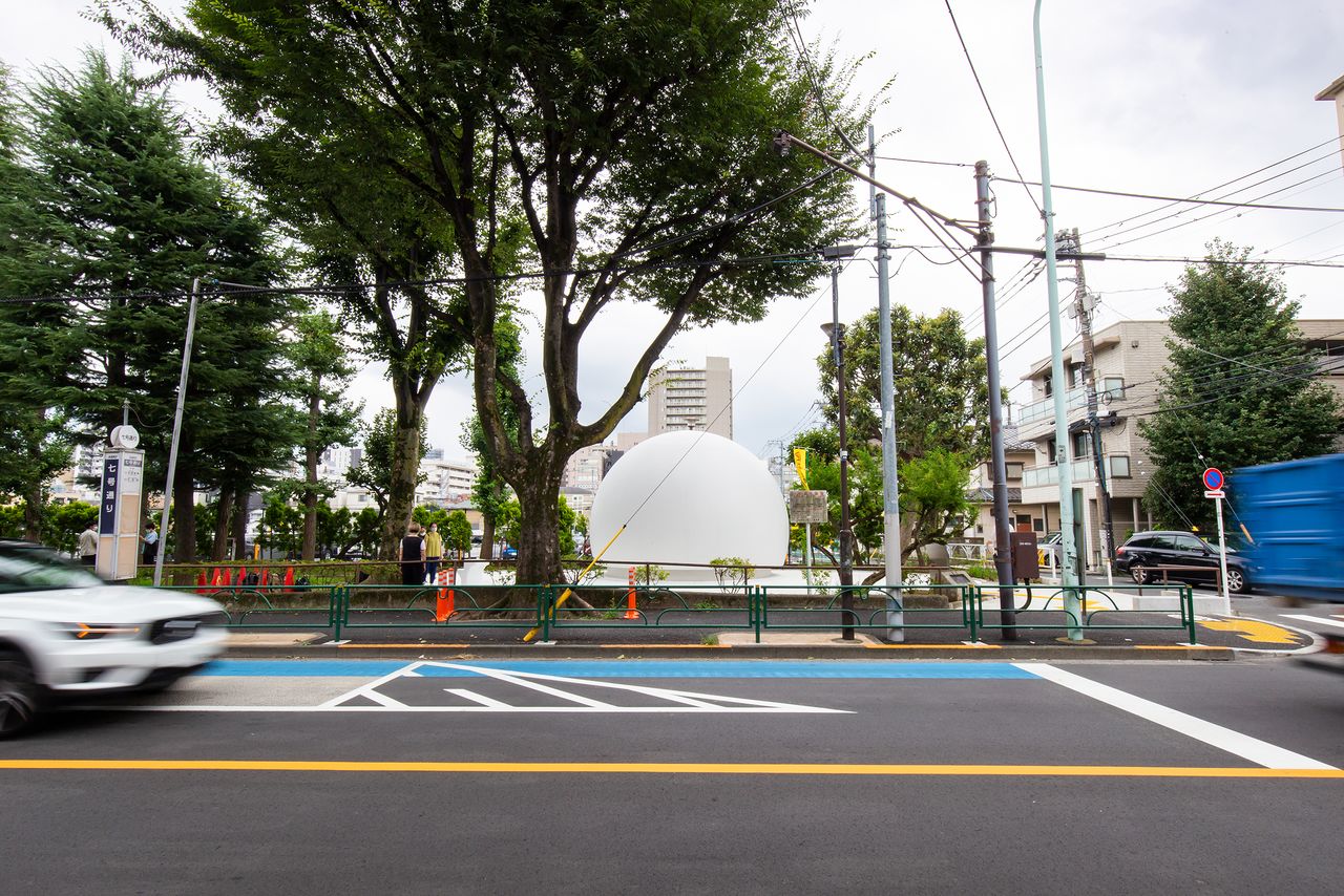 The white sphere of the Nanagō Dōri Park Toilet.