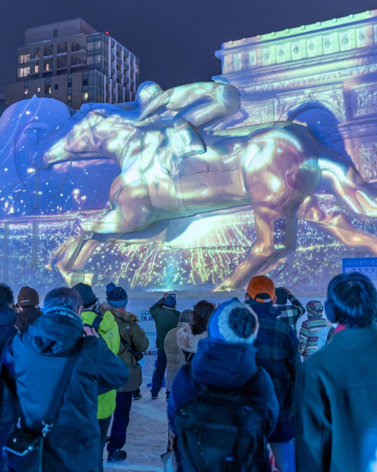 Fantastically carved and illuminated snow and ice sculptures draw crowds to the annual Sapporo Snow Festival, here seen in February 2020. (© Pixta)
