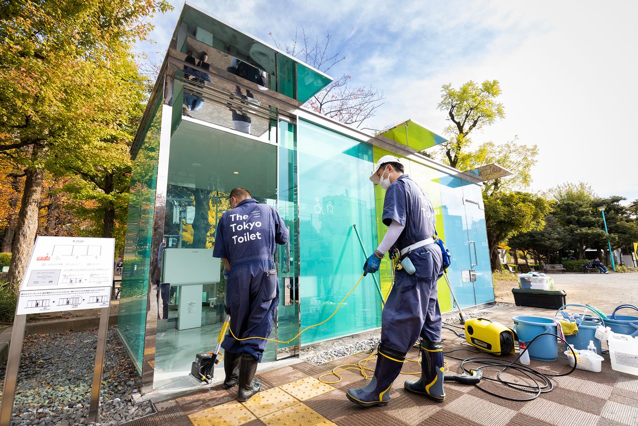 Ban Shigeru’s see-through toilet, at Haru-no-Ogawa Community Park undergoing cleaning.