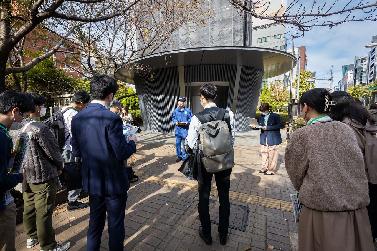 The first organized bus tour started at the Jingū-dōri Park toilet, designed by Andō Tadao.
