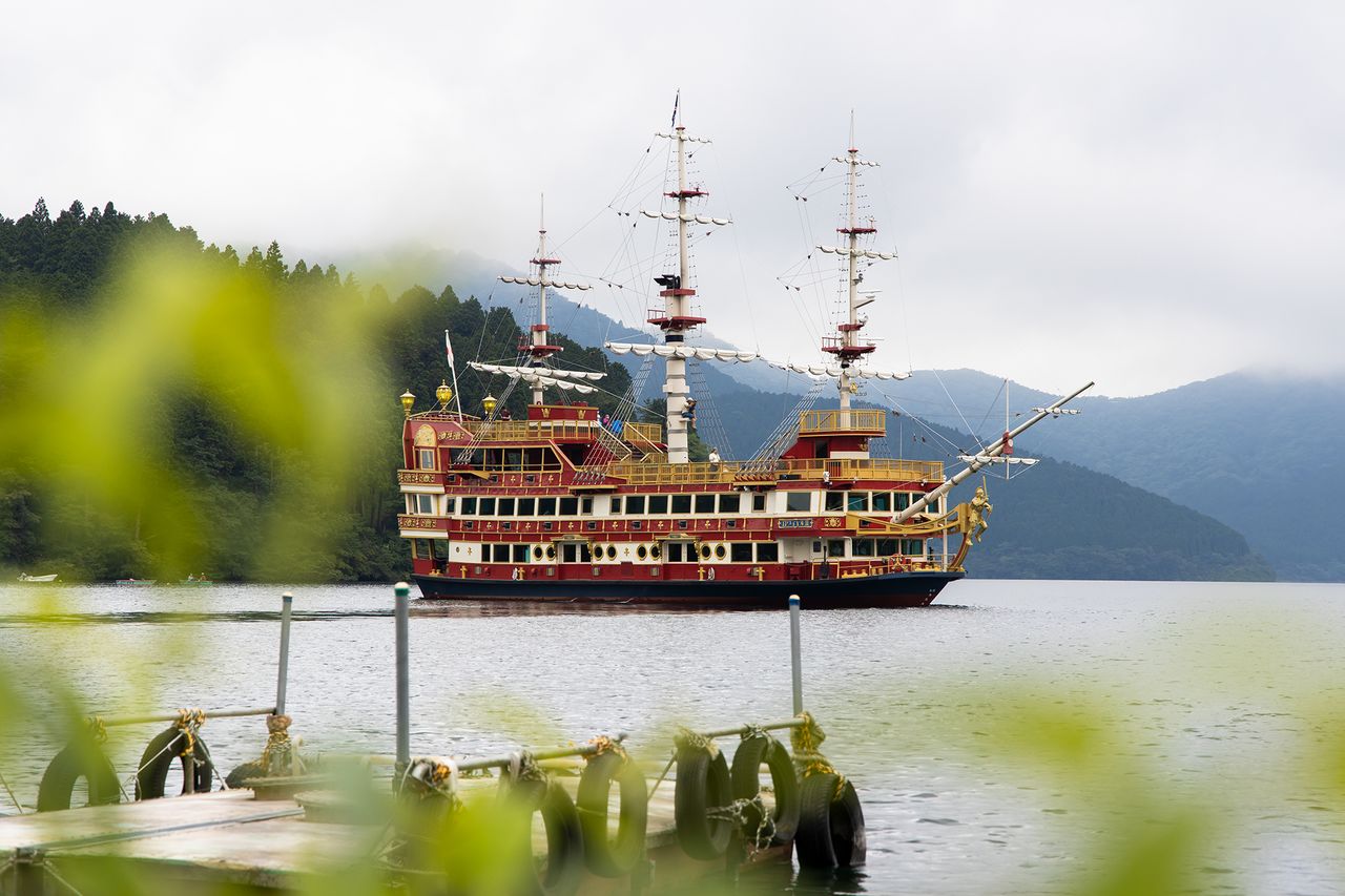 The Royal II cruises gracefully across Lake Ashi.