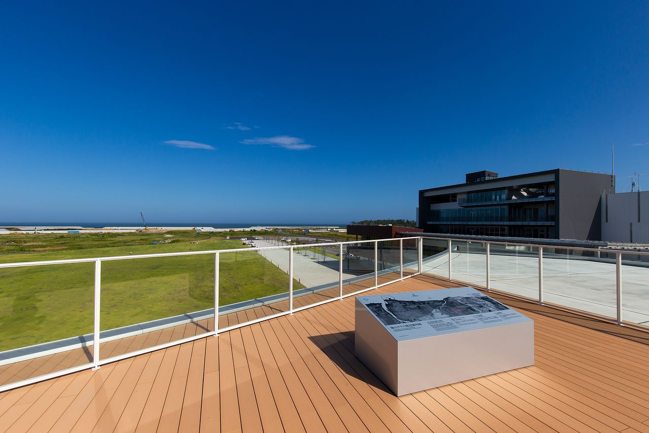 The observation deck on the museum roof offers a view of the massive sea wall running along the coast.