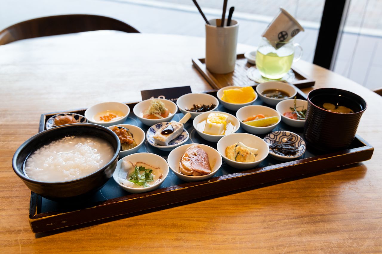 The 18-dish breakfast special is served with a bottomless bowl of rice porridge.