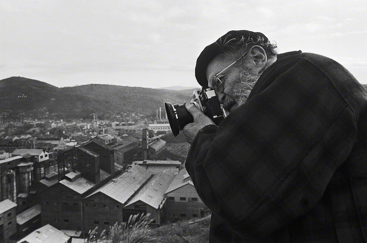 Eugene Smith photographing the Chisso chemical plant from the hills around Minamata in 1971.