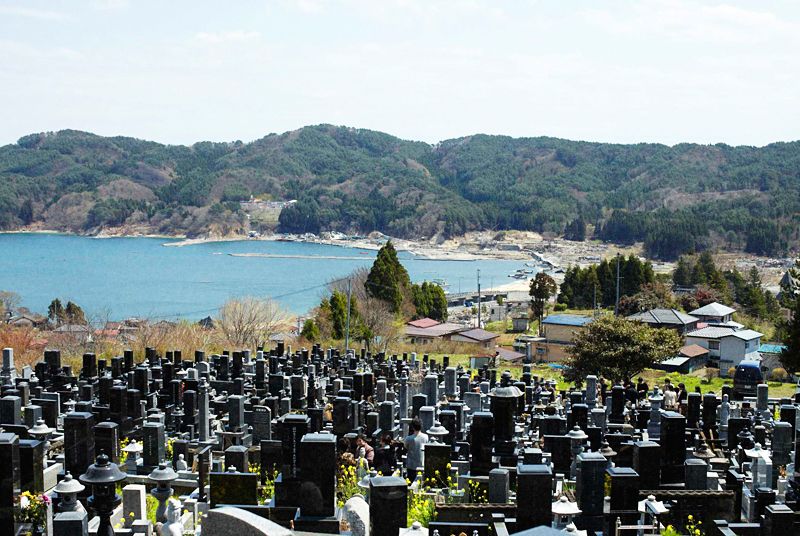 After the ceremony, relatives head to the graveyard, where those who perished in the disaster have this beautiful view to console their spirits.