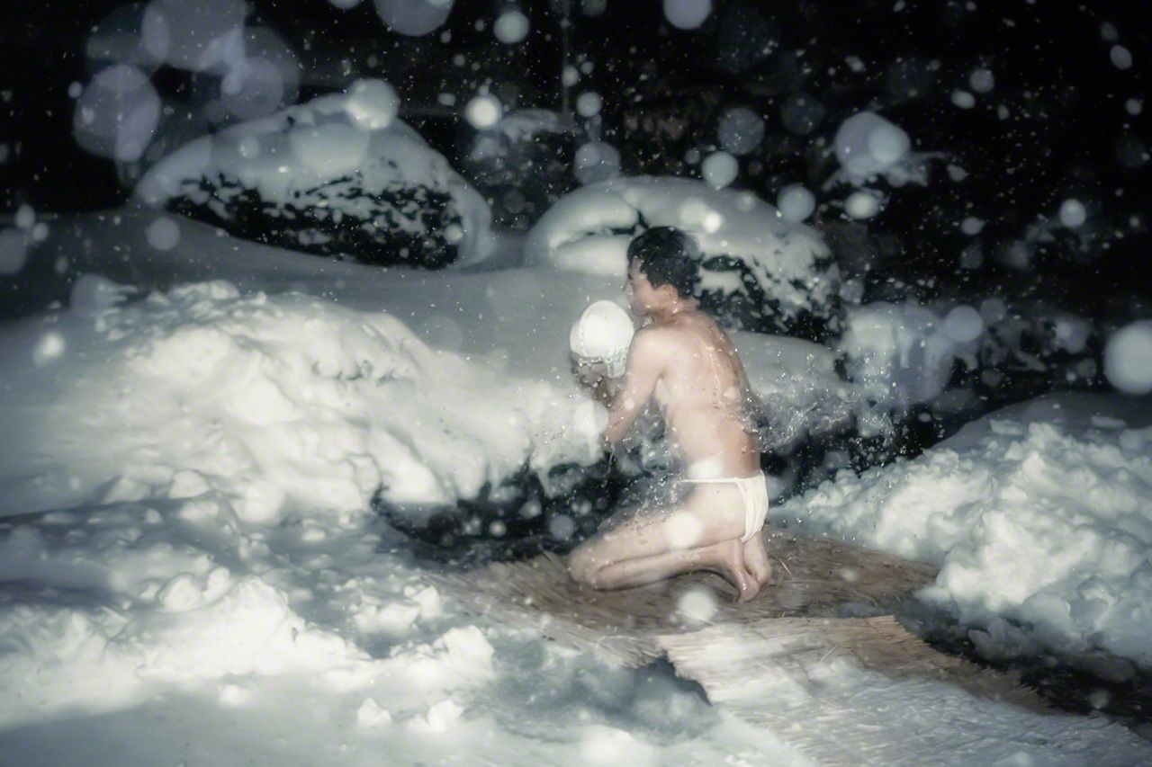 Bathing in icy waters as part of ritual purification.