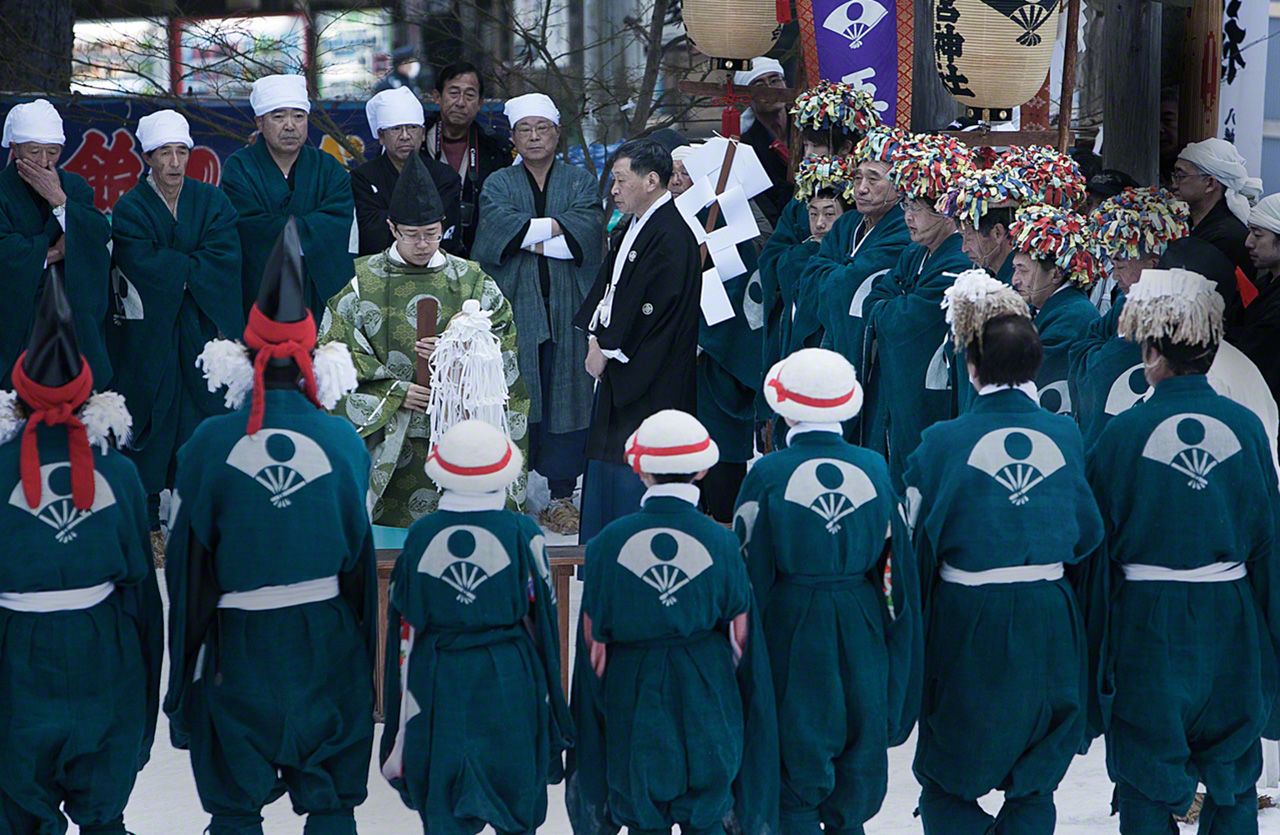 Performers from all four villages assemble within the shrine for a purification ritual.