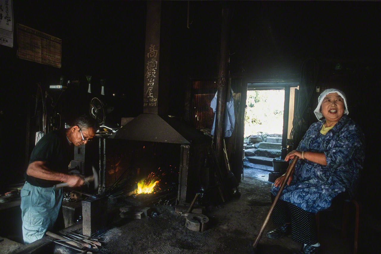 Husband and wife at work together at the Takahashi Kajiya blacksmith in Nima, Shimane Prefecture.