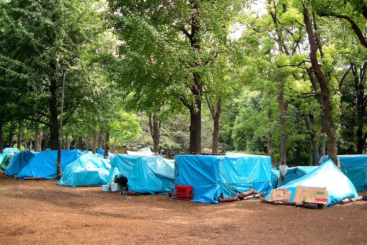 Tent city in a Tokyo public park as photographed by Maruyama in 2005.