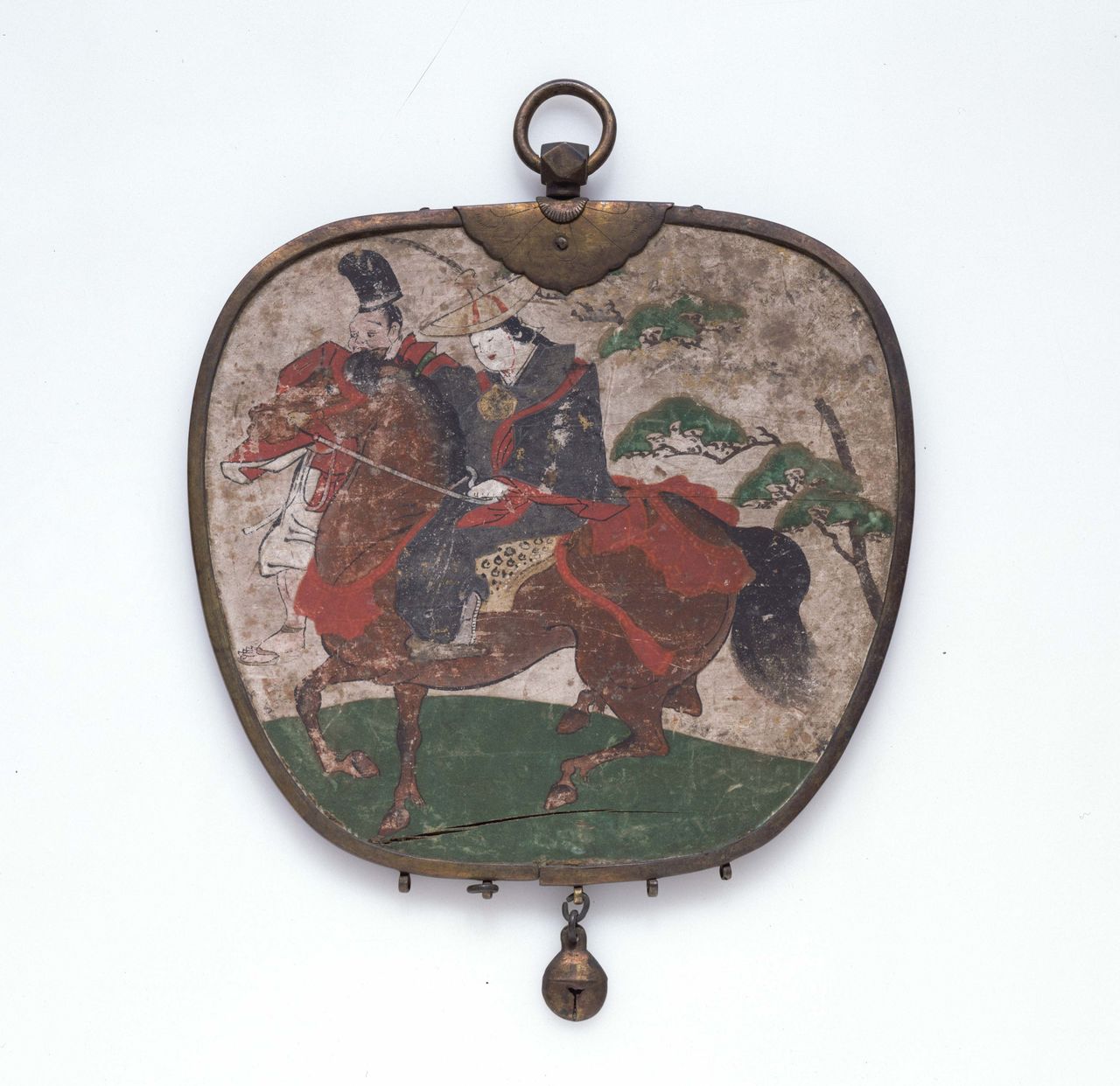 A wooden Buddhist decoration with the painting of a woman on horseback. Although different to the ema at Ōtokonushi Shrine, this is an early example of women appearing as a motif, from the Muromachi period. Its fan-shape is characteristic and represents the kind of elaborate designs for ema that began appearing in the fifteenth century. (Courtesy Tokyo National Museum)