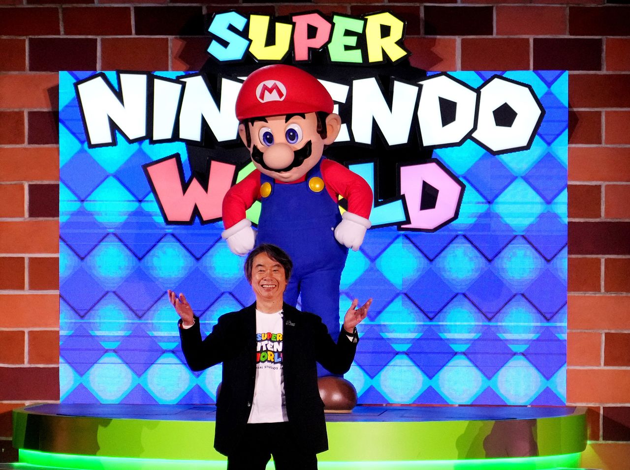 Mario’s creator, Miyamoto Shigeru at an event on February 15, 2023, marking the opening of Super Nintendo World at Universal Studios Hollywood. (© Sthanlee B. Mirador/Sipa USA via Reuters Connect)