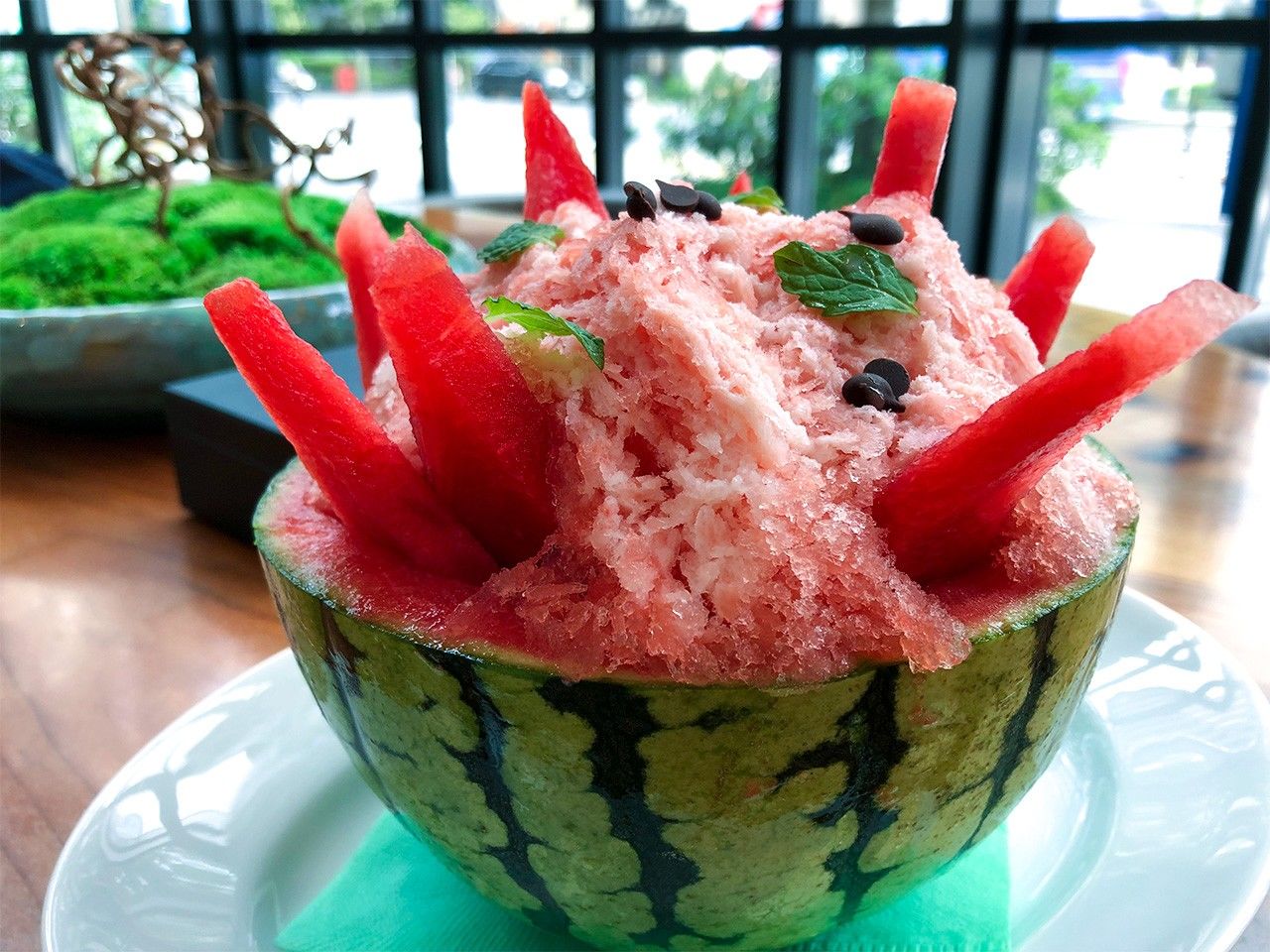 Kakigōri served in a watermelon bowl.