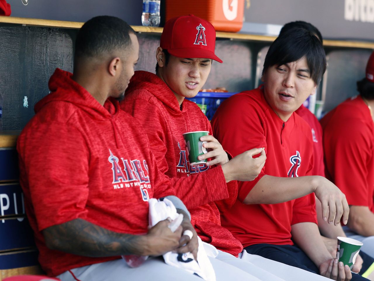 Mizuhara provides linguistic support on the bench during a game at Comerica Park in Detroit on May 31, 2018. He has a designated seat next to Ohtani in the dugout, and the two are rarely apart while at the ball park. (© AFP/Jiji)