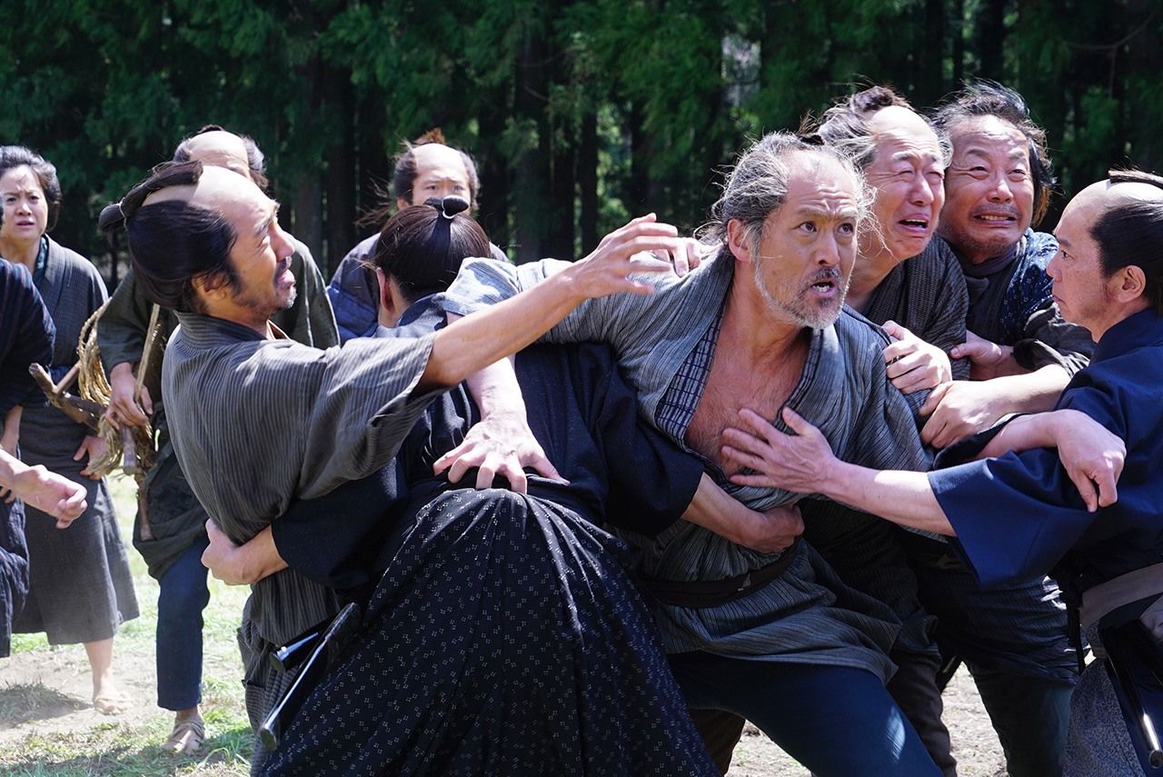 Tempers get heated during Ninomiya’s revitalization efforts. (© Movie Ninomiya Kinjirō Production Committee)