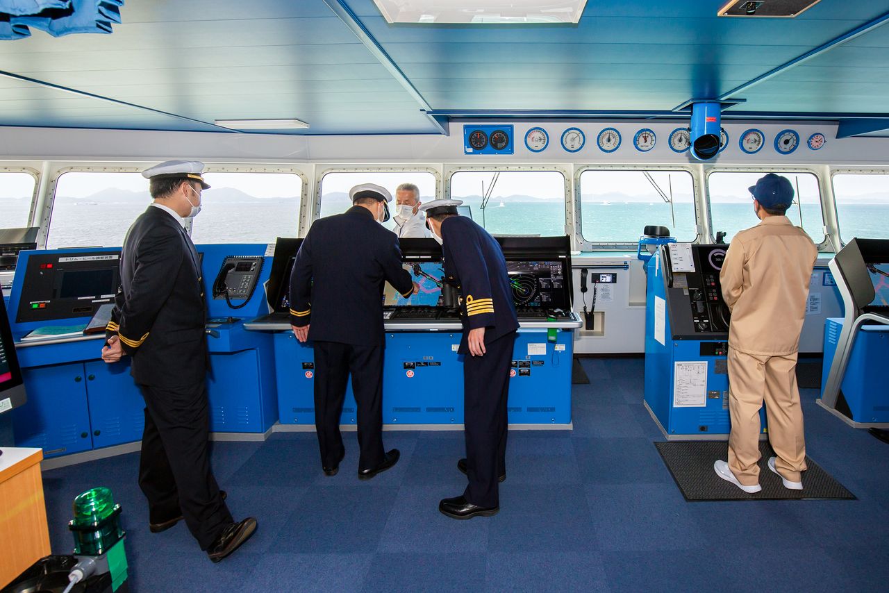 The ship’s bridge during autonomous operation, with no hands on the wheel.
