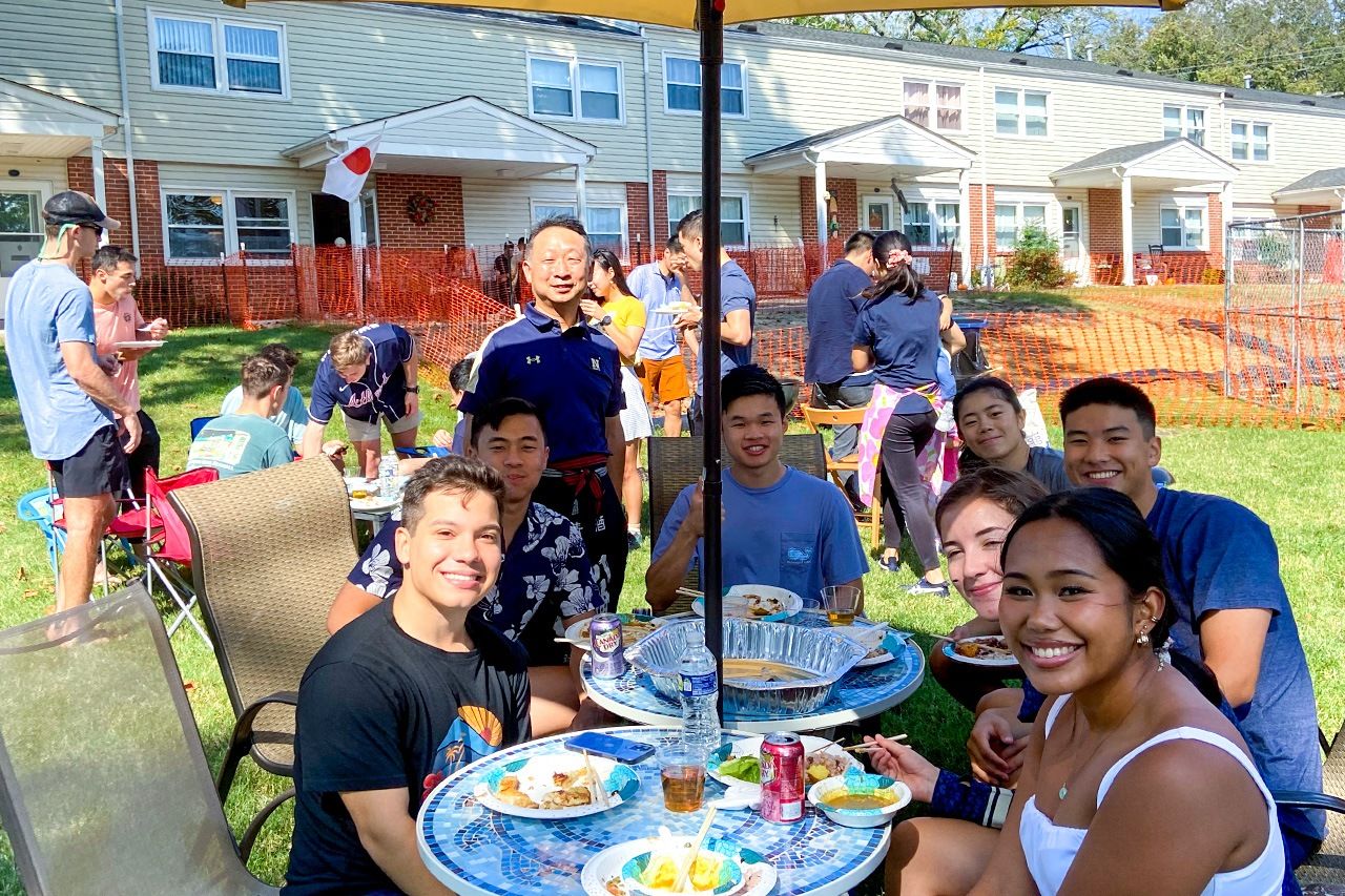 Midshipmen enjoy Japanese home-cooking at the Maeyama barbecue.