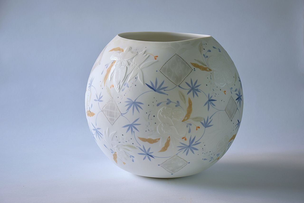 A porcelain jar with floral design.