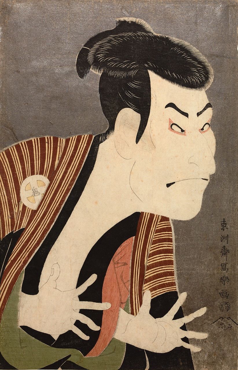 Sharaku’s Sandaime Ōtani Oniji no yakko Edobei (Ōtani Oniji III as the yakko Edobei) is a classic kubie work. Edobei was a yakko or servant and also a robber in a kabuki play, showing a distinctive evil expression in this 1794 work. (Courtesy ColBase)