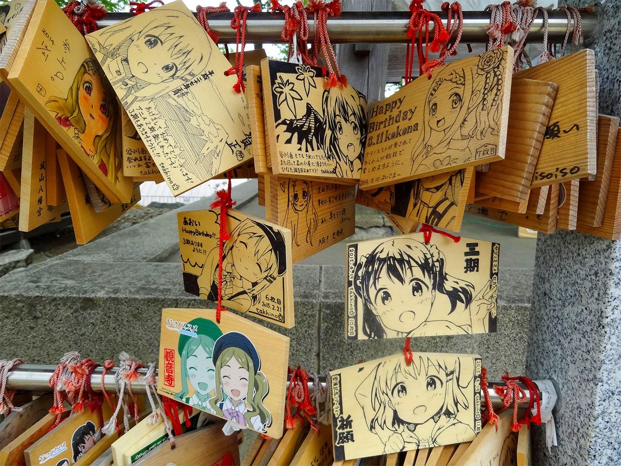 Ema expressing the prayers of anime fans in Kannonji. (© Gianni Simone)