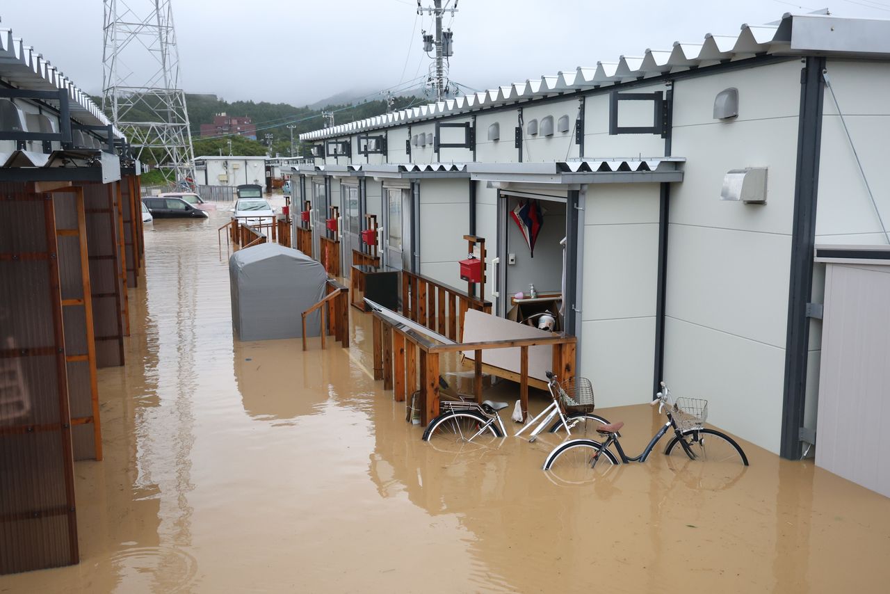 Flood waters from rainstorms inundate temporary housing for victims of the Noto Peninsula earthquake in Wajima, Ishikawa, on September 22, 2024. (© Jiji)