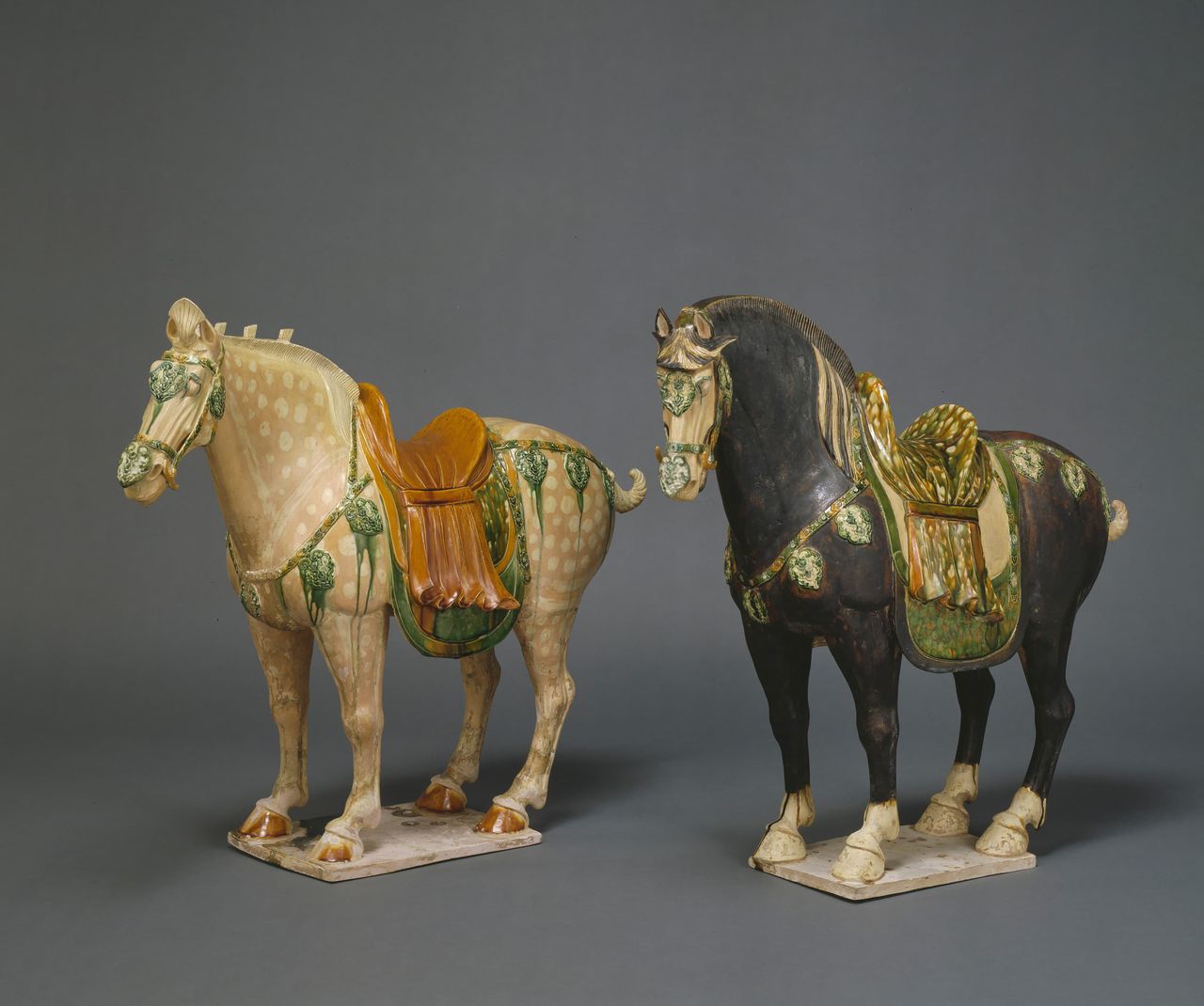 Pair of Horse Tomb Figures with Three-Color Glaze (Important Art Object). Tang Sancai (three-color glaze) ceramics were produced as grave goods for the tombs of the upper classes in China from around the second half of the seventh century to the mid-eighth century, during the flourishing of the Tang Dynasty. They had a major influence on Japan’s pottery culture. (© Kyoto National Museum).
