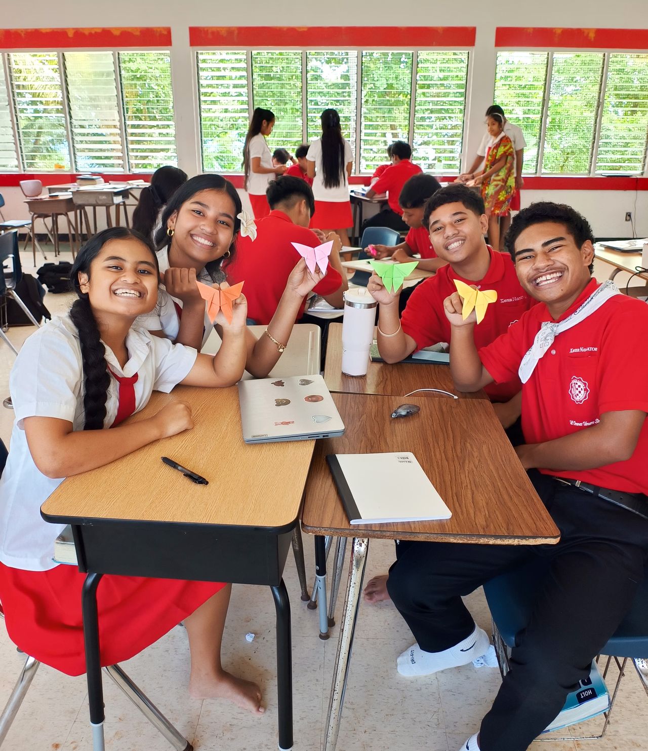 Xavier High School students display their origami creations. (© Julian Ryall)