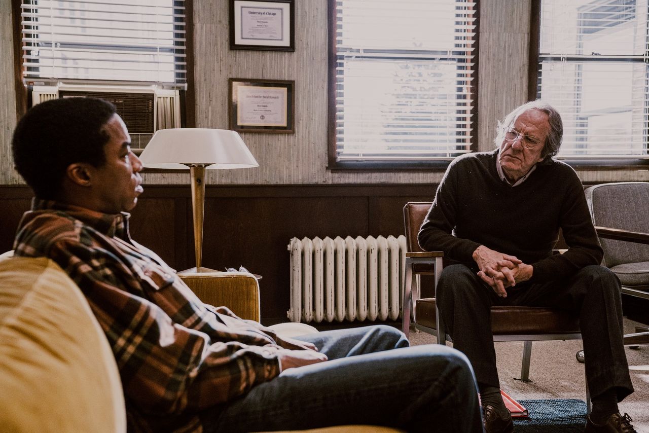 Nelson (Rodney Hicks) begins his recovery through sessions with Dr. Daniels (Geoffrey Rush), a PTSD specialist. (© Mr. Nelson, Did You Kill People? Film Partners; © Allen Nelson/Kōdansha)