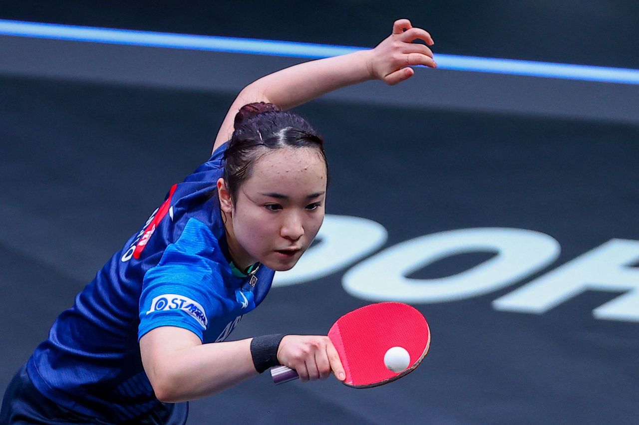 Itō plays a match at the WTT Contender Doha on in Doha, Qatar, on March 6, 2021. She won the women’s singles competition as well as the subsequent WTT Star Contender event. (© AFP/Jiji)