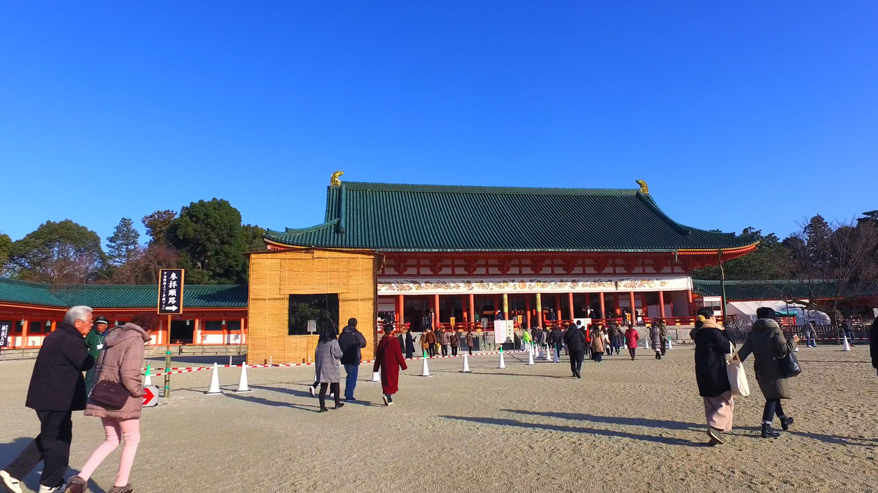 On the expansive grounds of Heian Jingū shrine, worshipers offer prayers for a new year free of illness and disaster, and generally hoping for peace and safety.