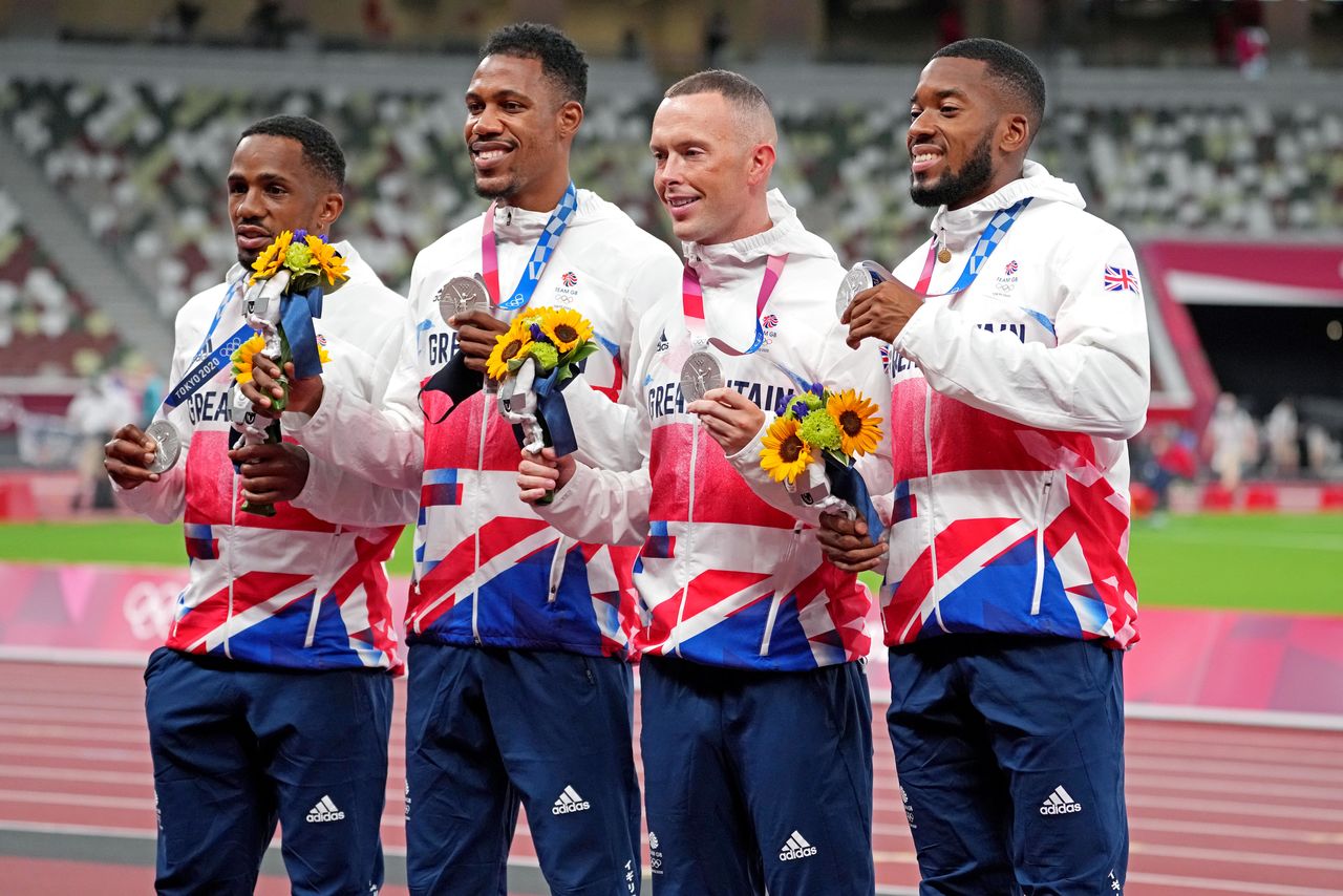 FILE PHOTO: Aug 7, 2021; Tokyo, Japan; Chijindu Ujah, Zharnel Hughes, Richard Kilty and Nethaneel Mitchell-Blake celebrate winning the silver medal in the men