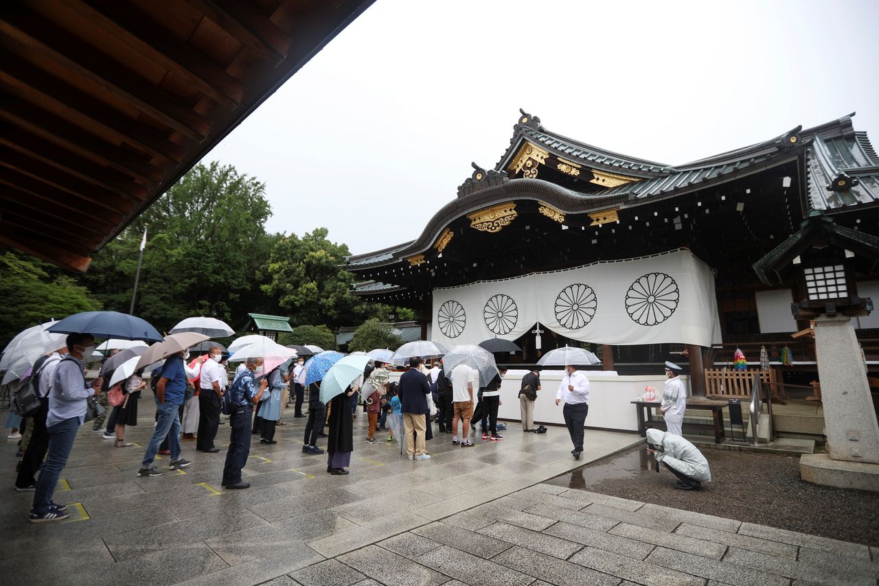 People practice social distancing while visiting Yasukuni Shrine on the 76th anniversary of Japan