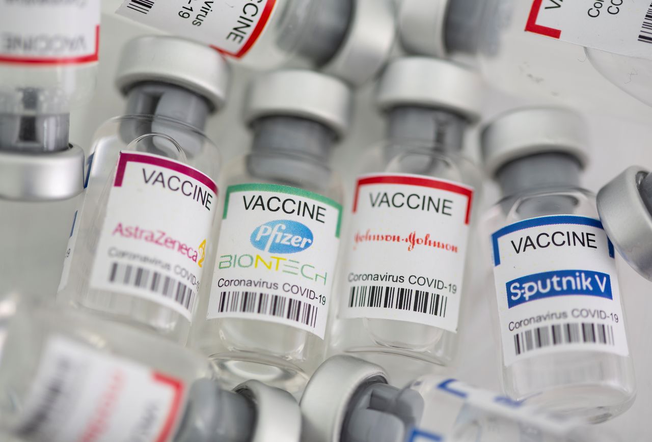 FILE PHOTO: Vials labelled "AstraZeneca, Pfizer - Biontech, Johnson&Johnson, Sputnik V coronavirus disease (COVID-19) vaccine" are seen in this illustration picture taken May 2, 2021. REUTERS/Dado Ruvic/Illustration/File Photo