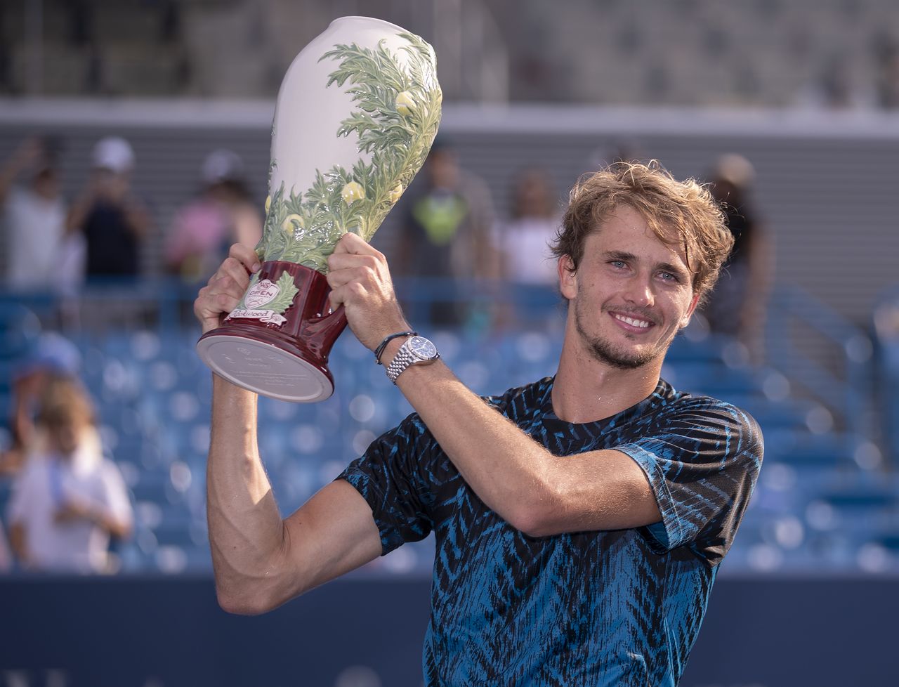 Aug 22, 2021; Mason, OH, USA; Alexander Zverev (GER) poses with the Rookwood Cup after defeating Andrey Rublev (RUS not pictured) in the final during the Western and Southern Open final at the Lindner Family Tennis Center. Mandatory Credit: Susan Mullane-USA TODAY Sports
