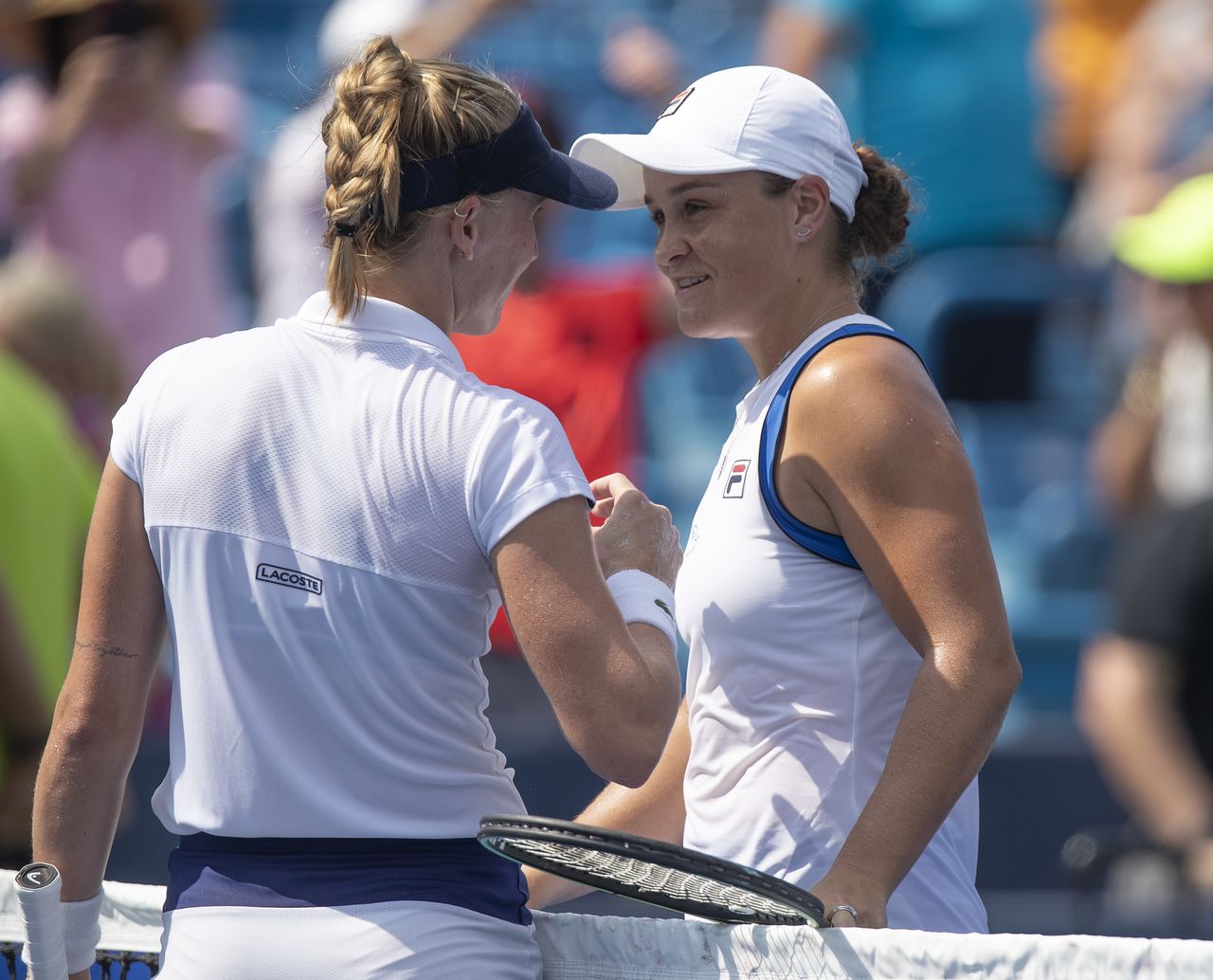Aug 22, 2021; Mason, OH, USA; Ashleigh Barty (AUS) and Jil Teichmann (SUI) at the net after their match during the Western and Southern Open final at the Lindner Family Tennis Center. Mandatory Credit: Susan Mullane-USA TODAY Sports