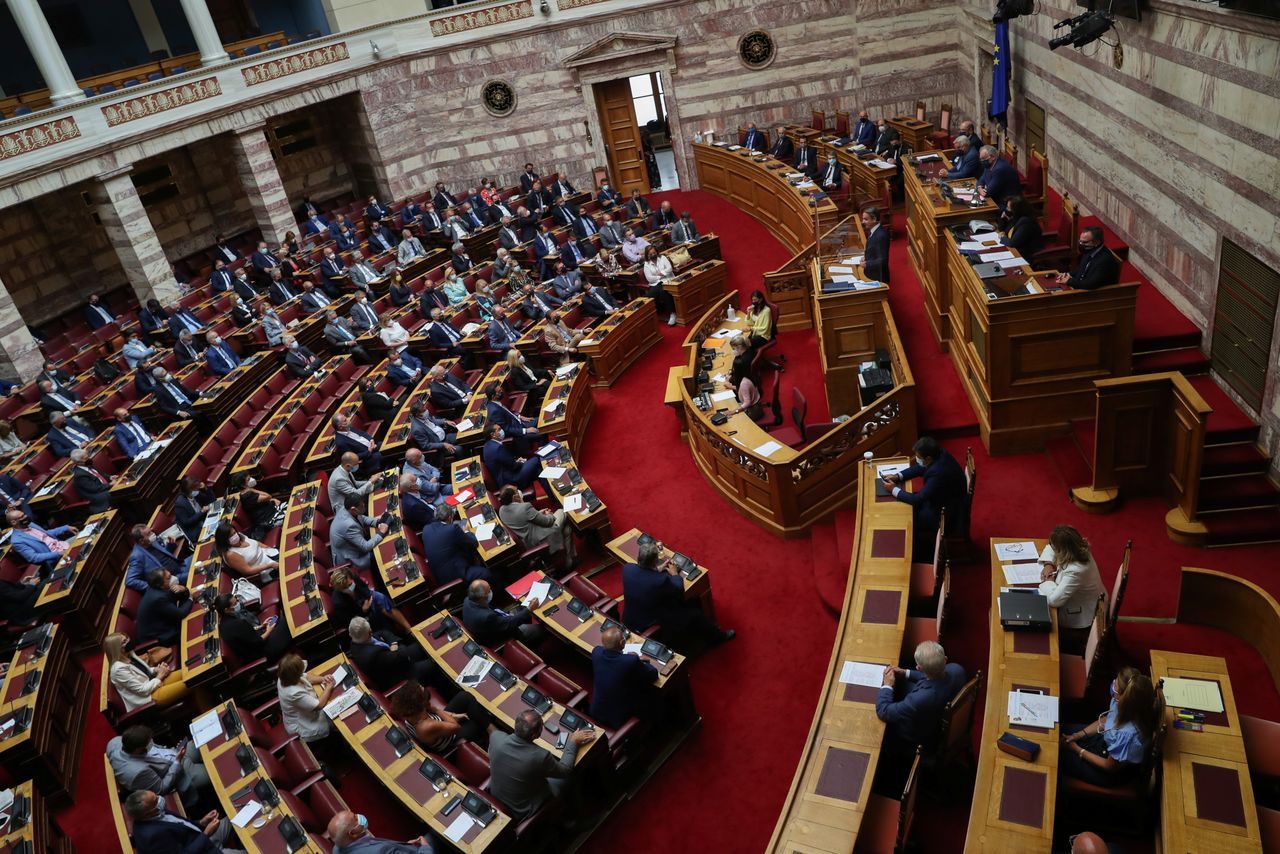 Greek Prime Minister Kyriakos Mitsotakis addresses lawmakers during a parliamentary session on recent wildfires, in Athens, Greece, August 25, 2021. REUTERS/Louiza Vradi