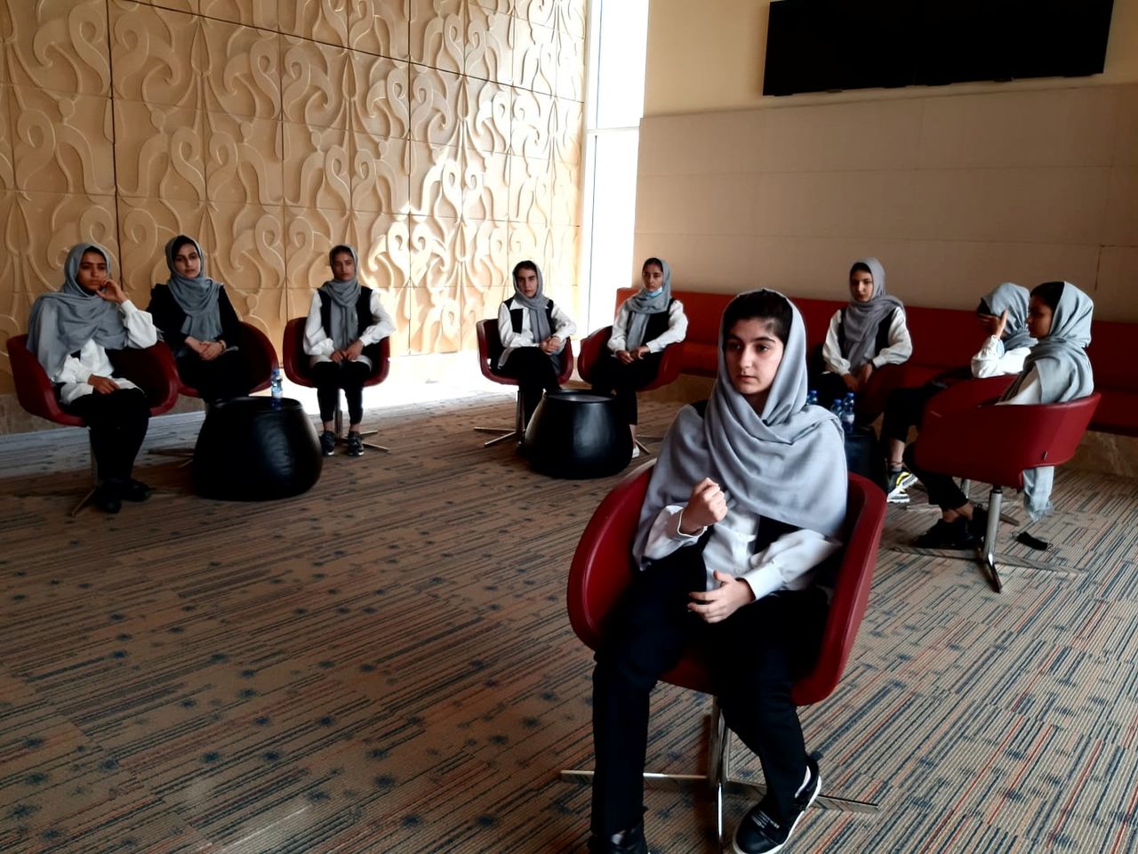 Ayda Haydarpour, a member of an Afghan all-girls robotics team who were evacuated last week from Afghanistan, talks during an interview with Reuters in Doha, Qatar August 25, 2021. REUTERS/Eman Kamel