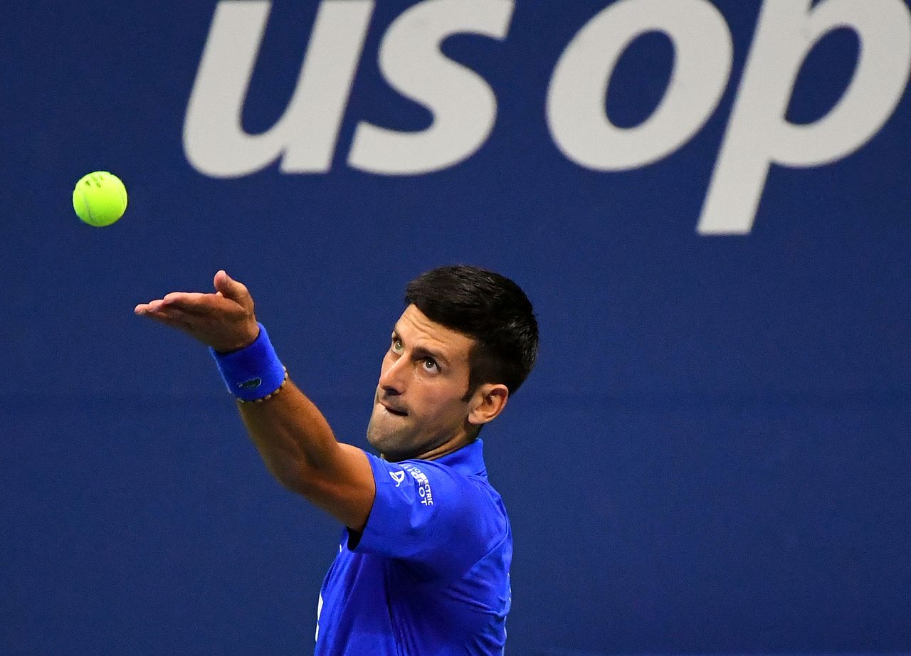 FILE PHOTO: Aug 31, 2020; Flushing Meadows, New York, USA; Novak Djokovic (SRB) serves the ball against Damir Dzumhur (BIH) on day one of the 2020 U.S. Open tennis tournament at USTA Billie Jean King National Tennis Center. Mandatory Credit: Robert Deutsch-USA TODAY Sports