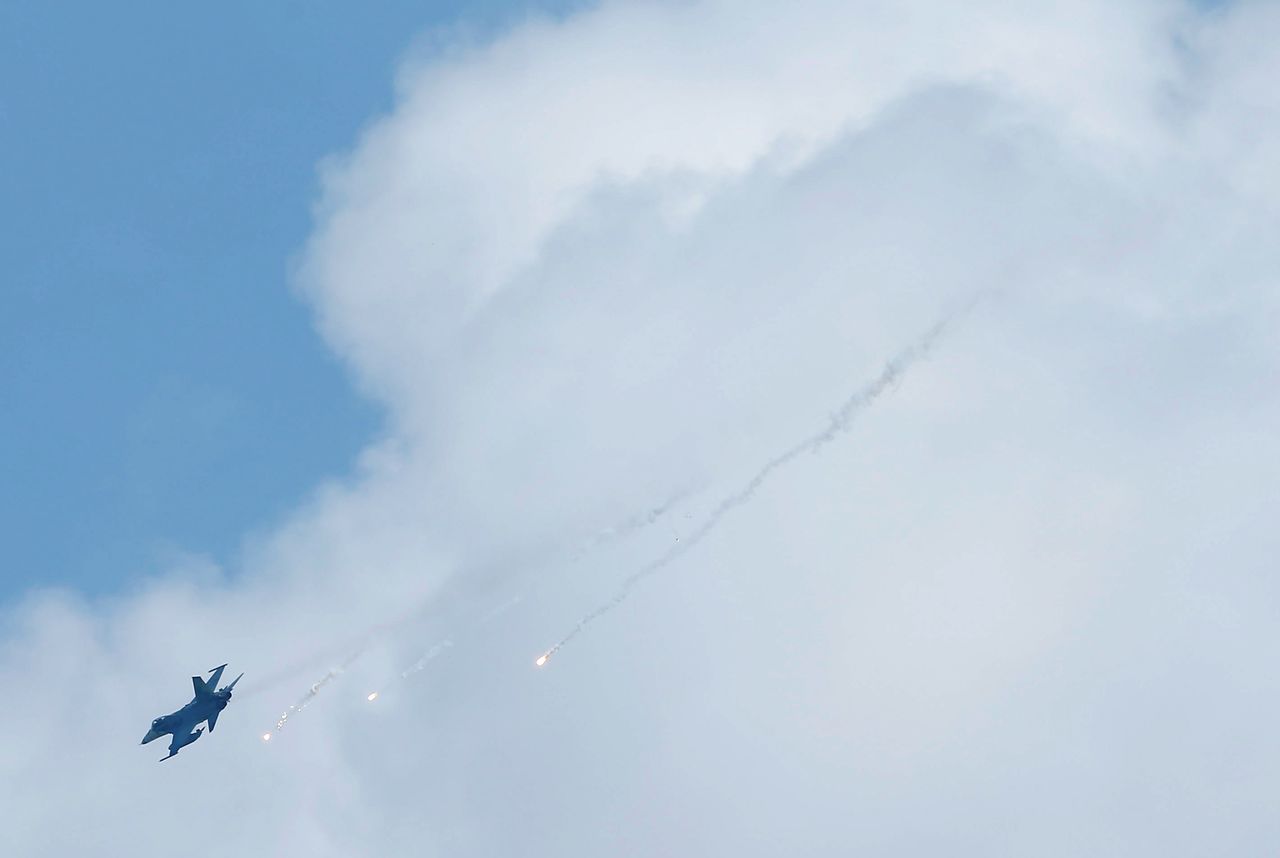 FILE PHOTO: A Taiwan domestically-built Indigenous Defense Fighter (IDF) releases flares during annual Han Kuang military drill simulating the China